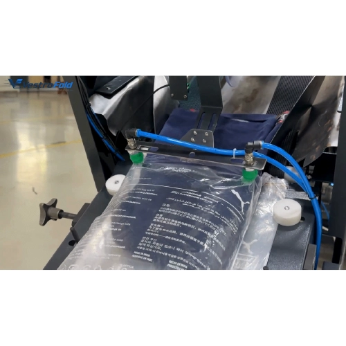 Automatic garment bagging process