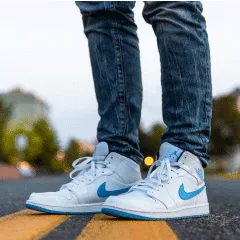  person wearing white and blue